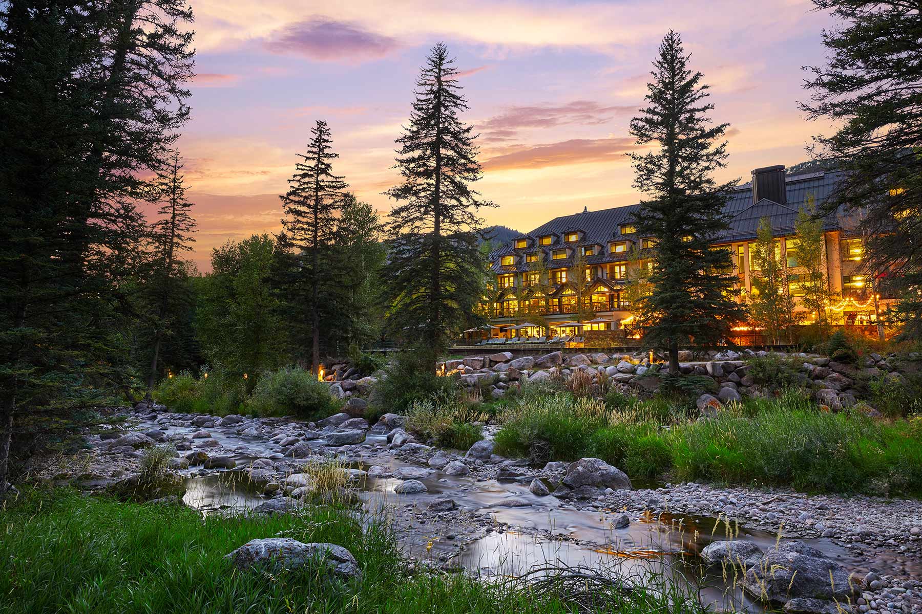 A hotel in the beautiful mountains at dusk in Vail.