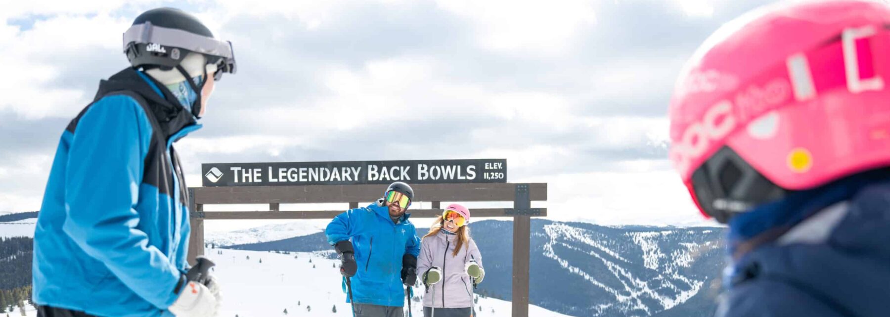 family skiing on the mountain