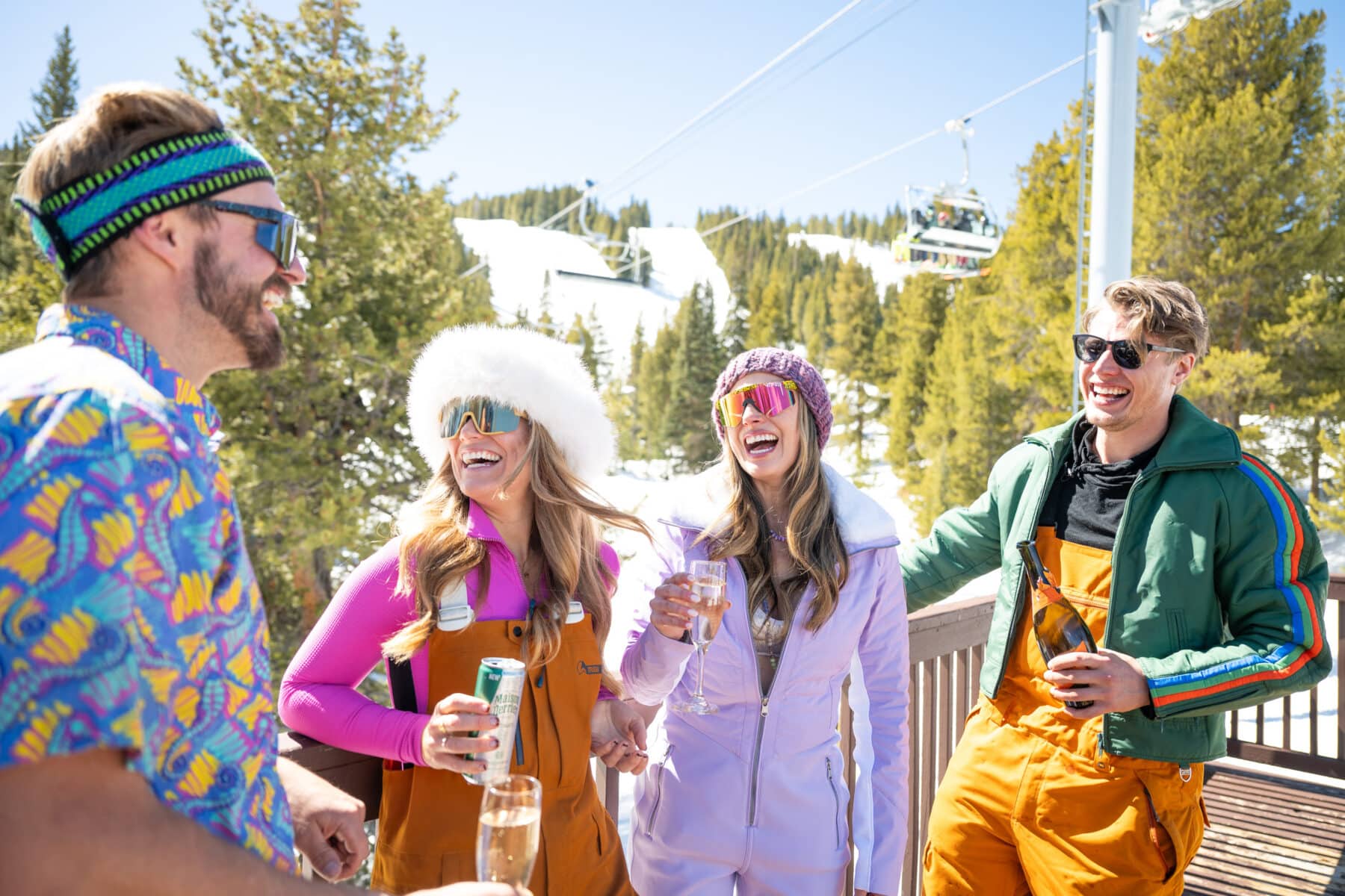 friends skiing and enjoying apres