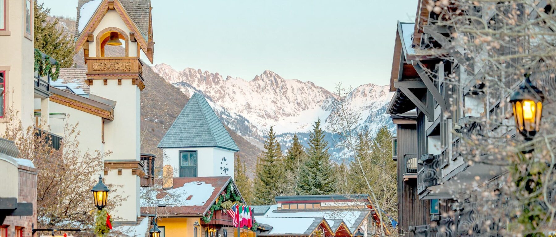 Vail Village clock tower with people walking around